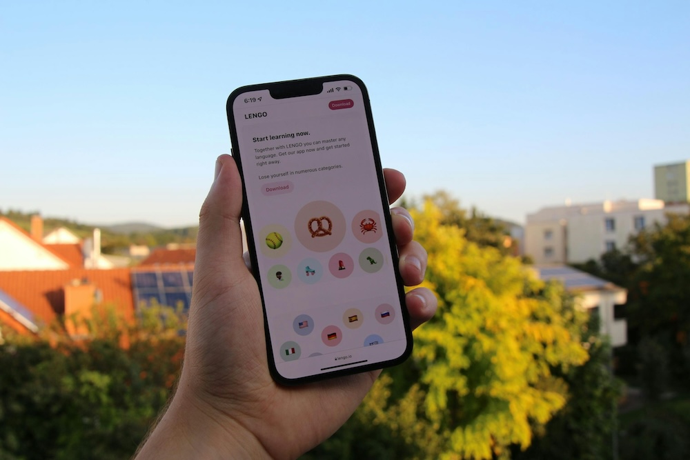 Person Holding Mobile Phone